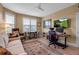 Office featuring hardwood floors, comfortable seating area, and natural light at 3621 North Point Rd # 603, Osprey, FL 34229
