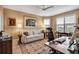 Office featuring a comfortable seating area, hardwood floors, and large windows at 3621 North Point Rd # 603, Osprey, FL 34229