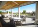 Charming patio offers outdoor seating and scenic views of the pristine golf course at 3621 North Point Rd # 603, Osprey, FL 34229