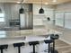 Modern kitchen featuring a spacious island, stainless steel appliances, and bright, open design at 3710 Gulf Of Mexico Dr # E22, Longboat Key, FL 34228