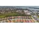 Aerial view of home and neighborhood highlighting location near the water and community features at 3921 Waypoint Ave, Osprey, FL 34229