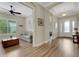 Inviting foyer showcasing hardwood floors and access to the living area at 3921 Waypoint Ave, Osprey, FL 34229