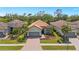 Charming single Gathering home featuring a tile roof, well manicured landscaping and an attached two car garage at 3921 Waypoint Ave, Osprey, FL 34229