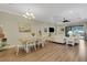 Bright and airy living and dining area perfect for entertaining at 3921 Waypoint Ave, Osprey, FL 34229