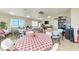 This common room offers plenty of tables and chairs for community meals and activities at 4040 Ironwood Cir # 401F, Bradenton, FL 34209