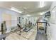 A bright community gym offers plenty of equipment for your workout needs and a mirrored wall at 4040 Ironwood Cir # 401F, Bradenton, FL 34209