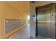 Hallway with mailboxes and an elevator for easy access to all floors at 4040 Ironwood Cir # 401F, Bradenton, FL 34209
