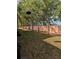 Landscaped back yard with mature tree cover and views from this peaceful outdoor area at 4707 1St E Ave # 4707, Palmetto, FL 34221