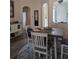 Cozy dining area with stylish table setting and arched doorways at 4707 1St E Ave # 4707, Palmetto, FL 34221