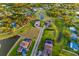 A view of the neighborhood pond, the lush trees, and manicured lawns that enhance the home at 4712 Margutta Ct, Sarasota, FL 34240
