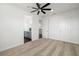 Spacious primary bedroom with neutral carpet, connecting to the ensuite bathroom and hallway at 4712 Margutta Ct, Sarasota, FL 34240