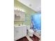 Bathroom with vanity, toilet and bath/shower with lively underwater themed shower curtain at 4790 70Th N St, St Petersburg, FL 33709