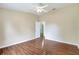 This large bedroom features wood-look floors and a connecting door to another room at 4790 70Th N St, St Petersburg, FL 33709
