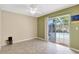 Bedroom with tiled floor and sliding door to the pool at 4790 70Th N St, St Petersburg, FL 33709
