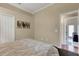 This is a view of the bedroom that includes a closet and bathroom with a tile floor at 4926 Sabal Lake Cir, Sarasota, FL 34238