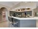 This kitchen has bar seating, stainless appliances, and lots of storage at 4926 Sabal Lake Cir, Sarasota, FL 34238