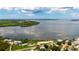Aerial view showcasing the nearby waterway and the surrounding landscape at 516 45Th Street W Ct, Palmetto, FL 34221
