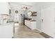 Bright kitchen features white cabinets, stainless steel appliances, and stylish decor elements at 516 45Th Street W Ct, Palmetto, FL 34221