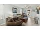 Cozy living room featuring comfortable seating, natural light, and a relaxed atmosphere at 516 45Th Street W Ct, Palmetto, FL 34221