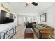 Cozy living room with modern furniture, ceiling fan, and neutral-toned decor at 516 45Th Street W Ct, Palmetto, FL 34221