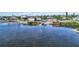 Scenic waterfront view showcasing boat docks and charming residential homes nestled along the coastline at 516 45Th Street W Ct, Palmetto, FL 34221