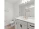 Bathroom featuring a single sink vanity, ample counter space, and modern fixtures, showcasing a clean design at 5317 Patano Loop, Palmetto, FL 34221