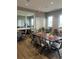 Elegant dining area with stylish tables, chairs, and contemporary decor at 5317 Patano Loop, Palmetto, FL 34221