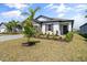 Charming home exterior with well-maintained landscaping and attractive curb appeal at 5317 Patano Loop, Palmetto, FL 34221