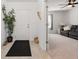 Open living room with neutral tones, tile flooring, and natural light, providing a comfortable living space at 5317 Patano Loop, Palmetto, FL 34221