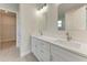 Elegant bathroom showcasing double sinks with modern fixtures and ample countertop space, offering both style and functionality at 5322 Syracuse Rd, Venice, FL 34293