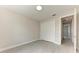 This bedroom features a spacious closet with white doors and modern gray floors at 5322 Syracuse Rd, Venice, FL 34293