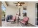 Covered patio with outdoor seating and grill; great for entertaining and relaxing at 5412 Royal Poinciana Way, North Port, FL 34291