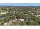 Community aerial view featuring homes nestled among lush trees, providing a sense of tranquility and natural beauty at 5712 Garden Lakes Fern, Bradenton, FL 34203