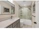 This bathroom features a shower and tub combo with a tiled wall at 5712 Garden Lakes Fern, Bradenton, FL 34203