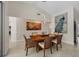 Dining room with modern chandelier and decorative wall art at 5712 Garden Lakes Fern, Bradenton, FL 34203