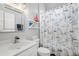 Bright and clean bathroom features a nautical-themed shower curtain at 5907 90Th Avenue E Cir, Parrish, FL 34219