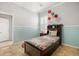 Bright bedroom featuring stylish window shutters and cheerful decor at 5907 90Th Avenue E Cir, Parrish, FL 34219