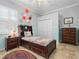 Bright bedroom features a cute daybed and cheerful decor for a comfortable and inviting space at 5907 90Th Avenue E Cir, Parrish, FL 34219