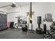 A well-equipped home gym featuring weight training equipment and fitness accessories for convenient workouts at 5907 90Th Avenue E Cir, Parrish, FL 34219