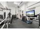 Home gym featuring training equipment, weights, and a motivational display for a complete fitness experience at 5907 90Th Avenue E Cir, Parrish, FL 34219
