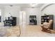 Open living area with a piano, desk, bookshelf, and tiled flooring at 5907 90Th Avenue E Cir, Parrish, FL 34219
