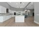 Full kitchen view highlighting the island, cabinets, and open layout at 600 Eagle Watch Ln, Osprey, FL 34229