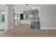 Bright kitchen with a view from the living space and modern white cabinetry at 600 Eagle Watch Ln, Osprey, FL 34229