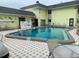 Community pool and surrounding area at 6703 Midnight Pass Rd # 206, Sarasota, FL 34242