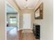 Home foyer featuring hardwood floors, a decorative mirror, and an elegant chandelier at 736 Rosemary Cir, Bradenton, FL 34212