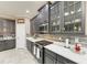 Kitchen features sleek cabinetry, stainless steel appliances, and granite countertops, complete with a cozy dining area at 736 Rosemary Cir, Bradenton, FL 34212