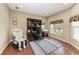 Well-lit home office with a comfortable chair, built-in desk, and large windows offering natural light at 736 Rosemary Cir, Bradenton, FL 34212