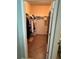 Walk-in closet with ample storage space, providing organization and convenience at 7508 Mikasa Dr, Punta Gorda, FL 33950