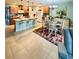 Well-lit kitchen with adjacent dining area, creating an inviting space for Gathering meals at 7508 Mikasa Dr, Punta Gorda, FL 33950