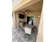 Covered patio with outdoor seating, a ceiling fan, and a view of the pool area at 7508 Mikasa Dr, Punta Gorda, FL 33950